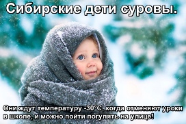 Маленькая девочка закутана в шаль. Зима.